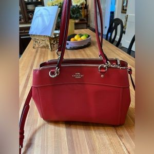 Coach bag, never used. Red with gold hardware